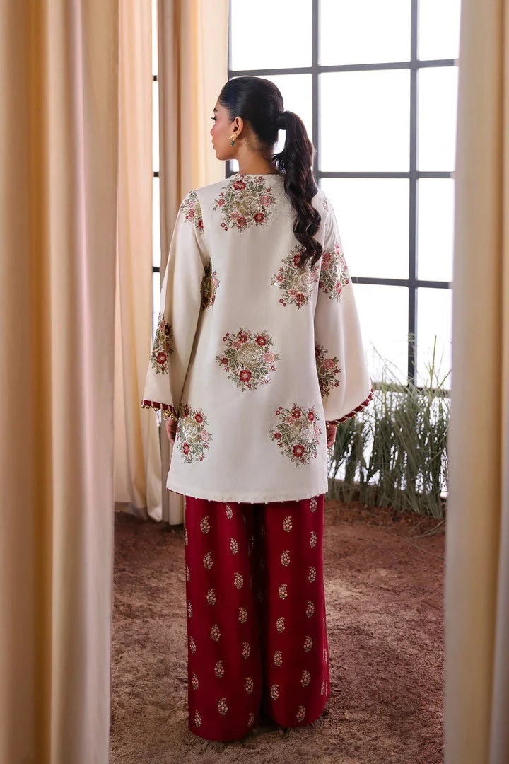 Ethnc - Off White pakistani fashion outfit in white, maroon tones.